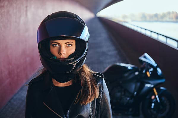 close up portrait of a biker girl inside the bridge
