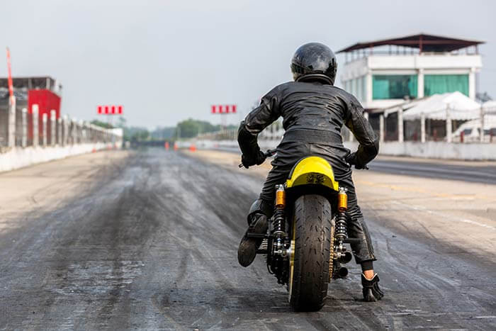 man-on-motorbike-on-the-road-racing-track-riding